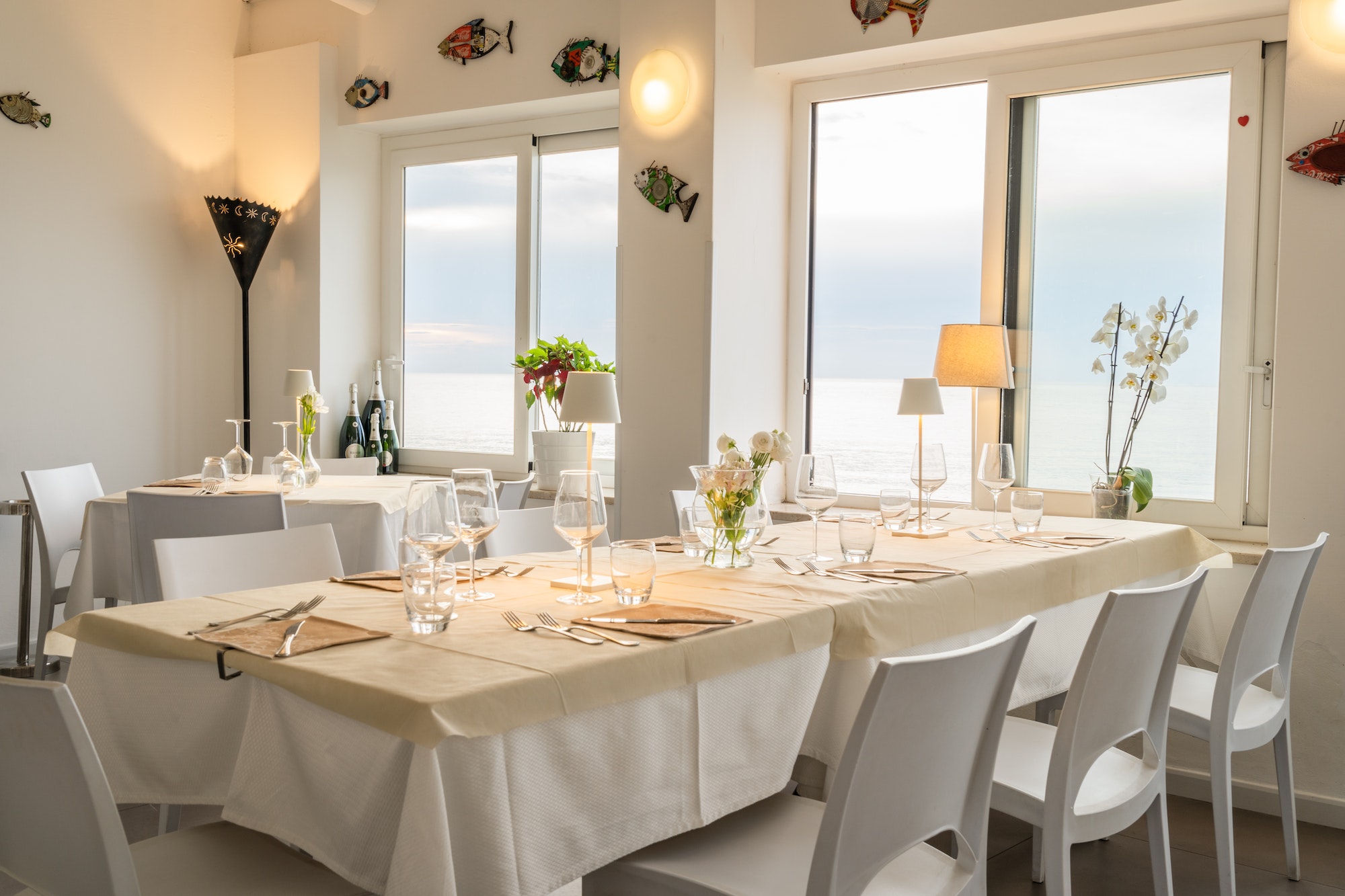 Interior of an elegant Italian restaurant with sea view