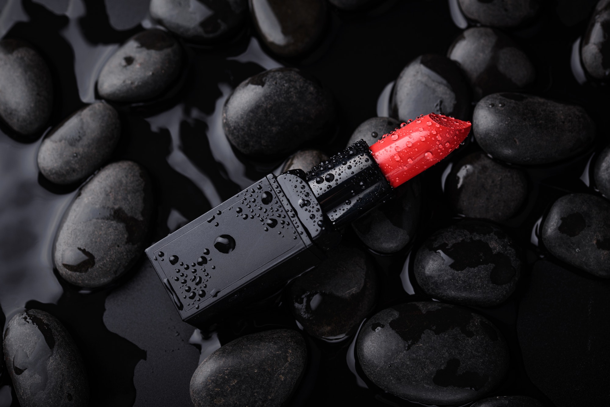 Red lipstick. Makeup cosmetic product photography